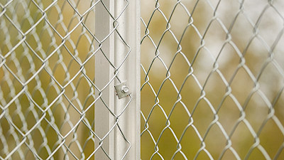 high quality chain link fencing fastened to the aluminium fence post.